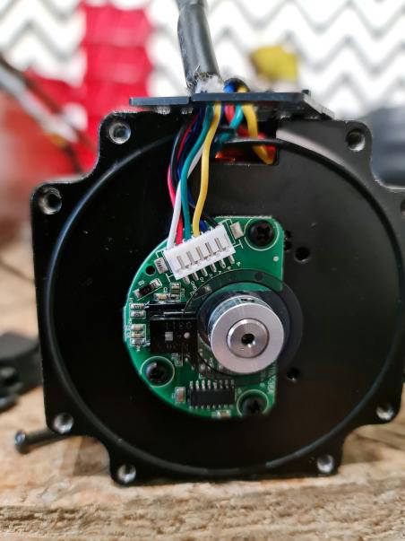 Cleaning encoder wheel